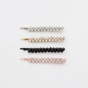 Four sparkling rhinestone bobby pins in silver gold black and rose gold tones