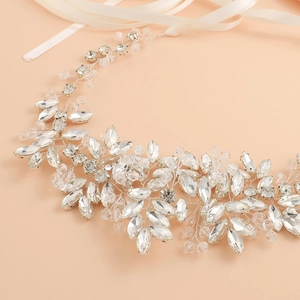 Elegante tralcio per capelli da sposa con filo d'argento, cristalli e nastro
