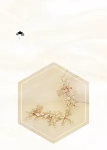 Detail of handmade gold leaf hair comb with pearls for bridal and wedding styling