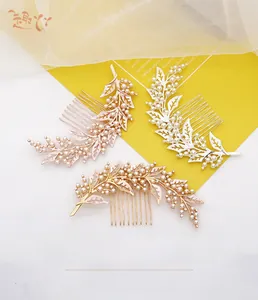 Detailed close-up of bridal hair combs featuring alloy leaves, pearls, and rhinestones