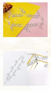 Détail macro du bandeau de mariée en strass argenté avec des motifs de vignes en cristal