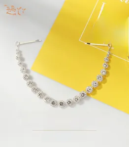 Detailed view of silver claw chain bridal headband with sparkling round cut rhinestones