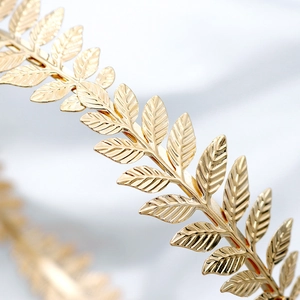 Golden laurel leaf bridal tiara with detailed metallic leaf texture and vintage design