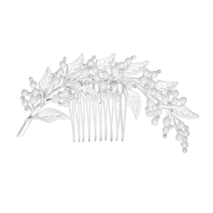 Silver vintage bridal hair comb with pearls and leaf patterns for elegant wedding hairstyles