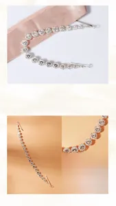 Macro detail of handmade vintage floral headband featuring silver rhinestones and vines