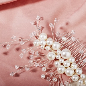 Exquisite bridal hair comb with handmade pearls and crystals on soft pink satin