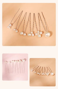 Detailed view of elegant pearl U-shaped hairpins with smooth white luster and metallic finish