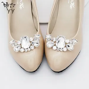 Detailed view of luxury crystal shoe clips with large rectangle rhinestones and pearls