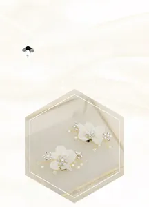 Detailed view of handmade bridal shoe clips with fabric flowers, rhinestones and pearls