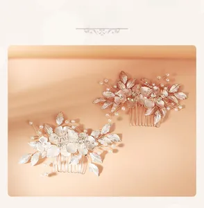 Detailed close-up of floral hair combs with pearls and rhinestones in silver and rose gold