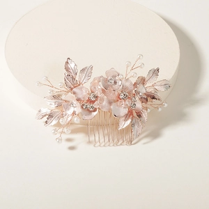 Rose gold bridal flower hair comb with delicate pearls and sparkling rhinestones