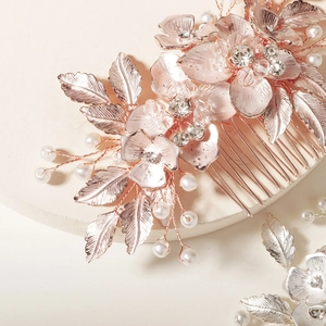 Elegant rose gold flower hair comb with pink petals, white pearls and sparkling crystals