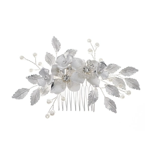 Exquisite silver floral hair comb with pearls and rhinestones for bridal hairstyles