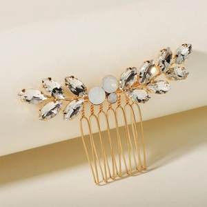 Peigne à cheveux mariée doré avec feuilles en cristal et pierres opales élégantes