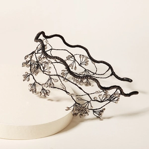 Ethnic bridal headband with crystal woven branch design on a double layered black wire