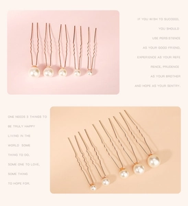 Detail view of pearl hair pin set with rose gold alloy wave sticks for hair styling