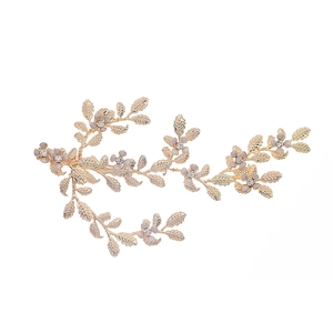 Elegant gold leaf hair clip with light purple flowers and sparkling crystal accents