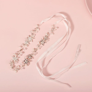 Handmade bridal headband with white pearls, crystals and silver metal flowers on pink ribbon