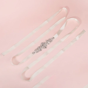 Luxurious bridal sash with sparkling crystal floral rhinestones on elegant ivory satin ribbon