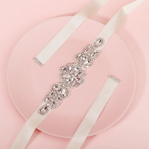 Elegant bridal wedding belt with ivory satin ribbon and luxury sparkling silver rhinestones
