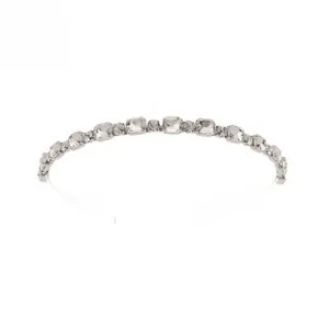 Detail of silver alloy headband featuring square-cut clear crystals and small round diamonds