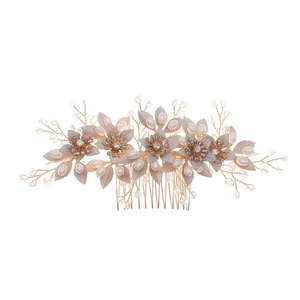 Handmade gold floral hair comb with purple leaves, pearls and crystals for wedding photography