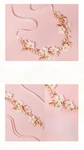 Detail of handmade bridal headband with white daisy petals and gold leaf rhinestones