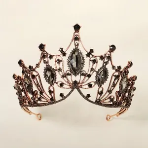 Close-up of gothic baroque bridal crown with black marquise crystals and bronze base
