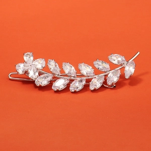 Detail view of silver leaf vine hair clip with marquise-cut sparkling zircon stones