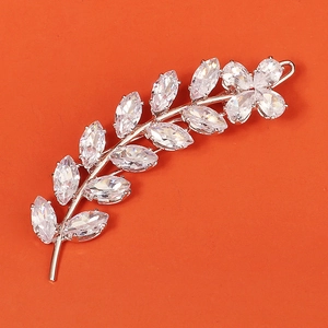 Close-up of elegant silver vine hair clip with sparkling marquise cut cubic zirconia