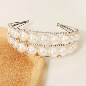 Elegant double-layer bridal headband featuring white pearls and sparkling rhinestones