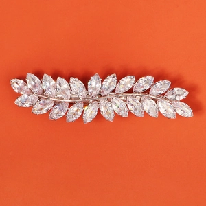 Macro shot of silver wheat ear hair clip with sparkling marquise cut zircons