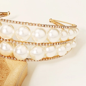 Elegant multi-layer pearl and rhinestone tiara with gold base for wedding hairstyles