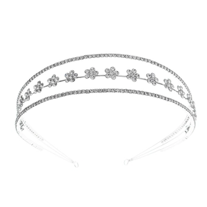 Silver triple bridal headband with hollow flowers and sparkling crystals on white background