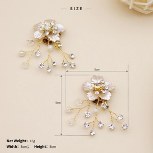Detail view of pearl and rhinestone floral shoe clips with 5cm size dimensions