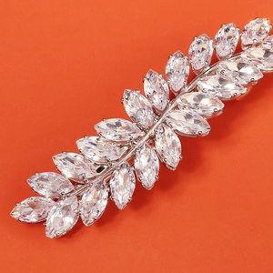Sparkling silver marquise cut zircon wheat leaf hair clip on orange background