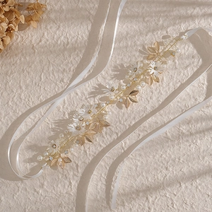 Floral bridal headband with white silk daisies, gold leaves, pearls and crystals