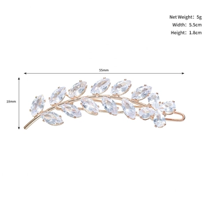 Detail view of rose gold leaf hair clip with marquise-cut zircon stones and 55mm dimensions