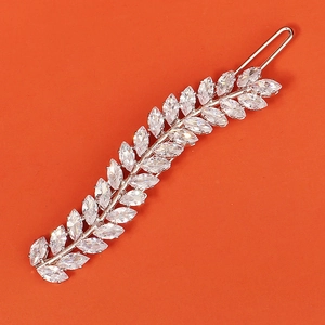 Close-up of elegant silver wheat ear hair clip with marquise-cut sparkling zircons