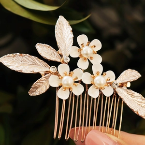 Handmade bridal hair comb with white enamel flowers, pearls and golden leaves