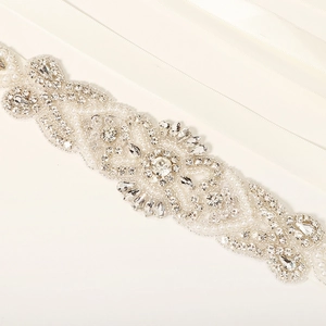 Elegant bridal belt with hand-sewn rhinestones and white pearls on ivory satin ribbon