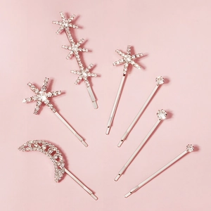 Lot de six barrettes argentées avec strass blancs motifs étoiles et lune scintillants