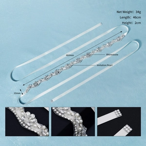Detail of bridal sash with 46cm hand-sewn rhinestones and faux pearls on white ribbon
