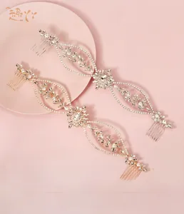 Close-up of radiant rhinestone hair combs with marquise crystals for bridal styling