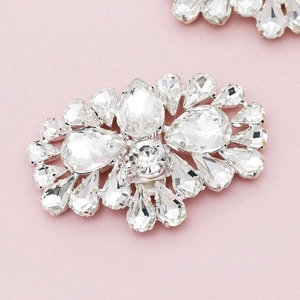 Macro shot of sparkling crystal shoe clip with pear and marquise cut rhinestones