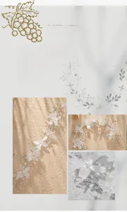 Detailed macro view of handmade white fabric flowers with pearls and crystal hair vine
