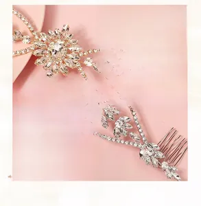 Close-up of handmade bridal hair comb with sparkling rhinestones and floral silver wire design