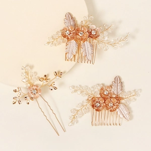 Detailed view of handmade rose gold bridal hair comb set with crystals and pearls