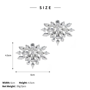 Detailed view showing 6cm sparkling crystal snowflake shoe clips with dimension markings