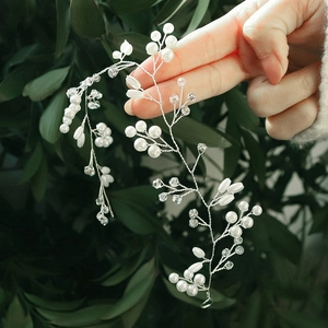 Elegant bridal hair vine with handmade white pearls and crystal beads for wedding hairstyles